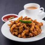 Complementary Tea with Veg Pakora (Buy 1, Get 1 Free) 